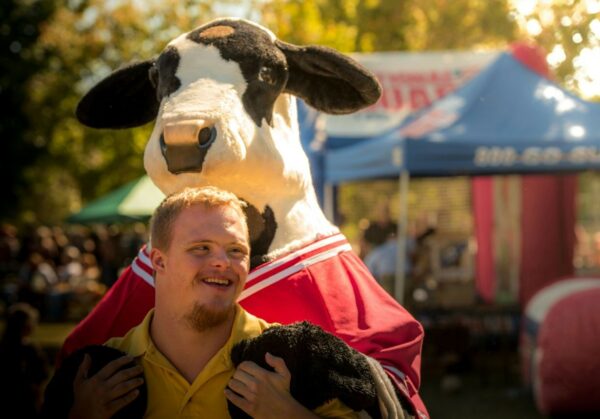 Young boy with Down Syndrome enjoying at a fair