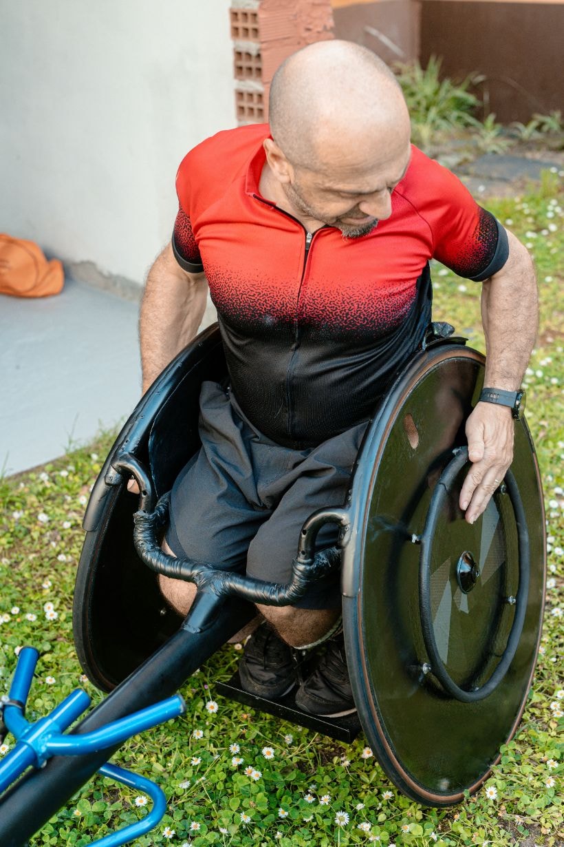 Man on a chair with wheels