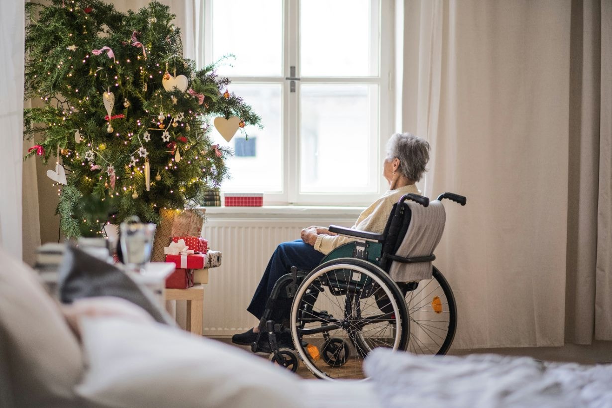 Old lady enjoying her Christmas holiday