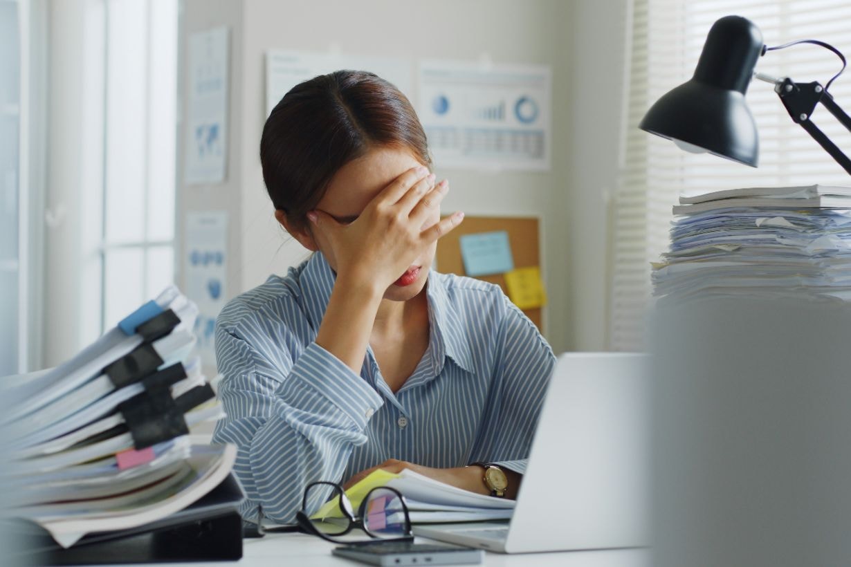 Lady employee depressed at her workplace